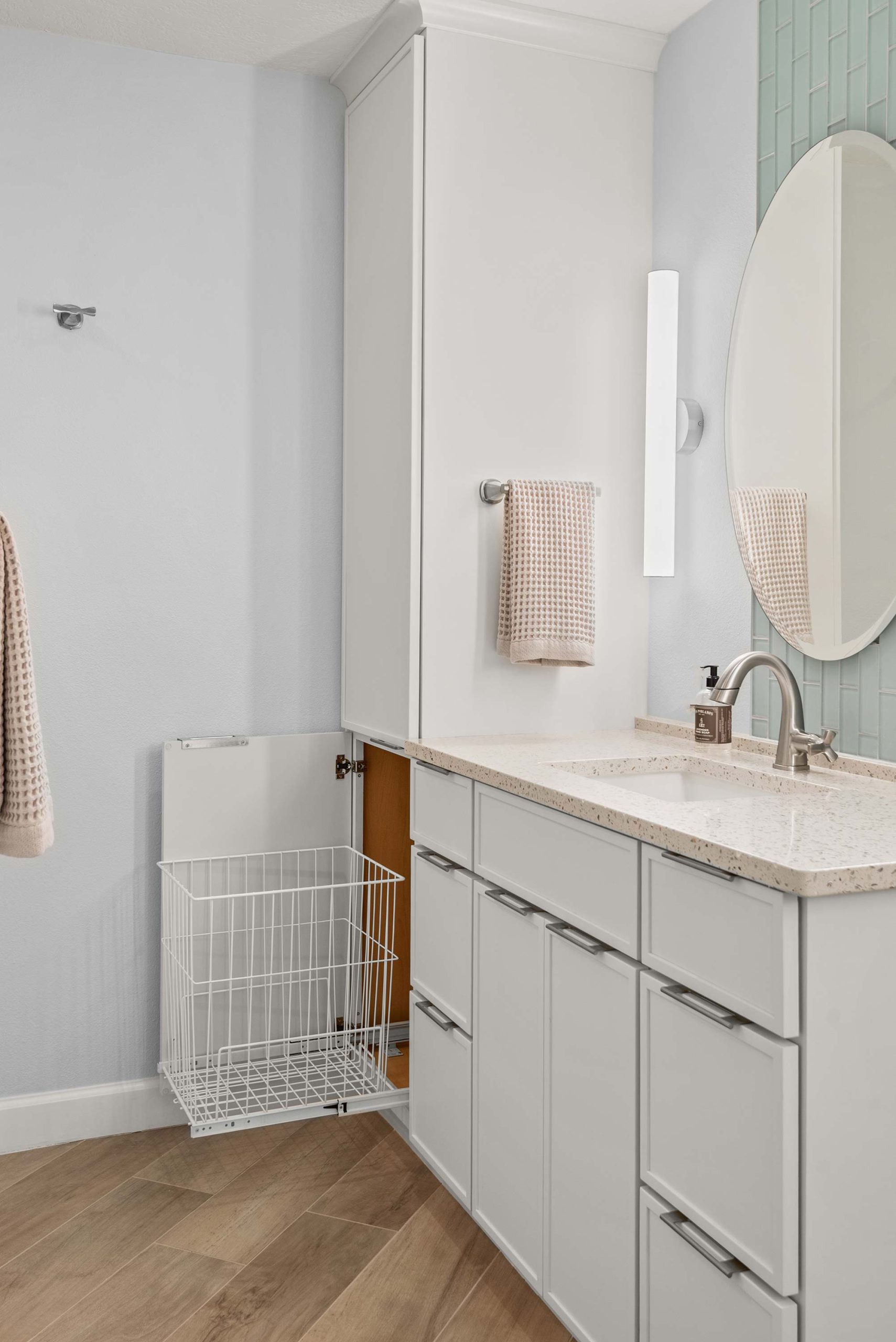 Glenwood Oaks Lane bathroom remodel white custom cabinets