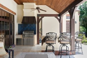 S&W Kitchens outdoor kitchen with blue stone backsplash