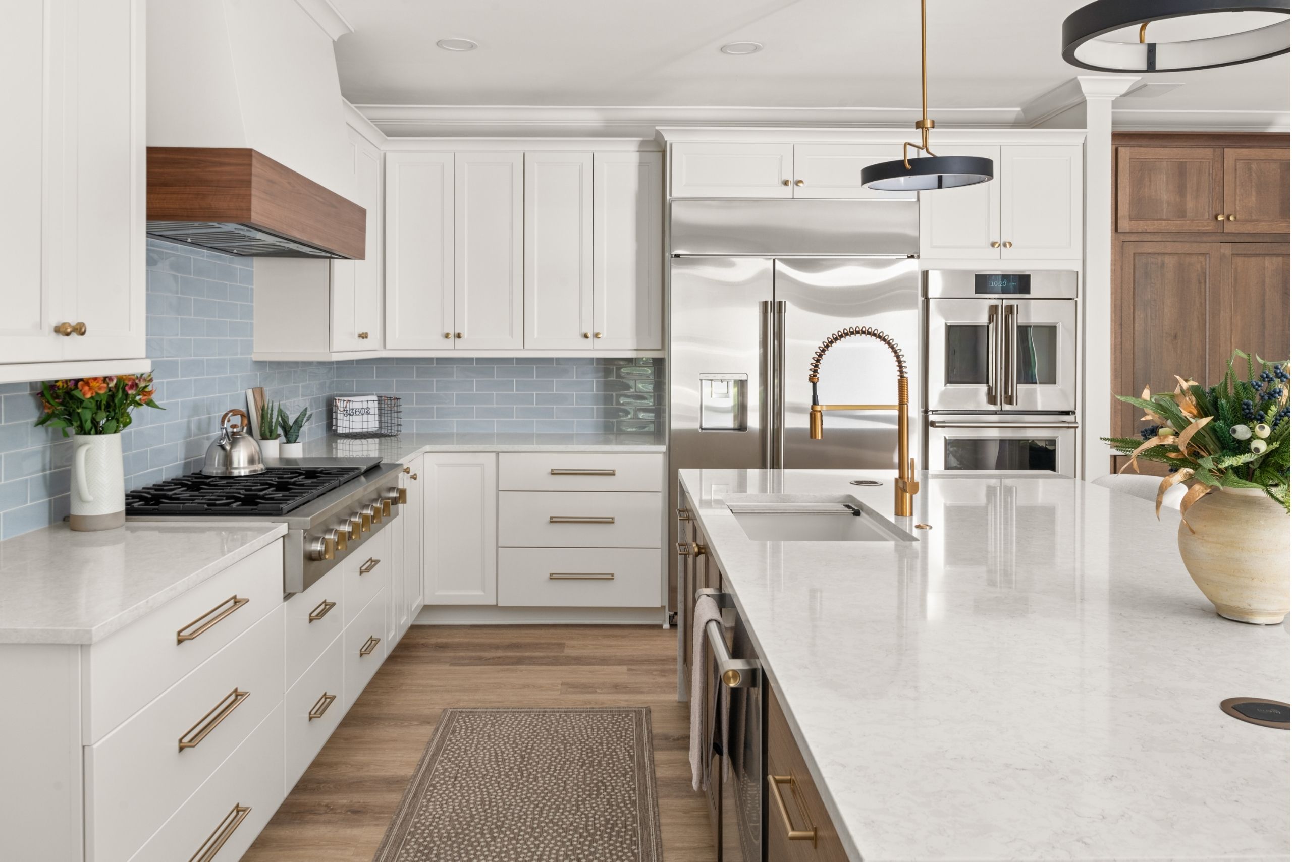 S&W Kitchens Tampa Remodel with white cabinets and blue backsplash