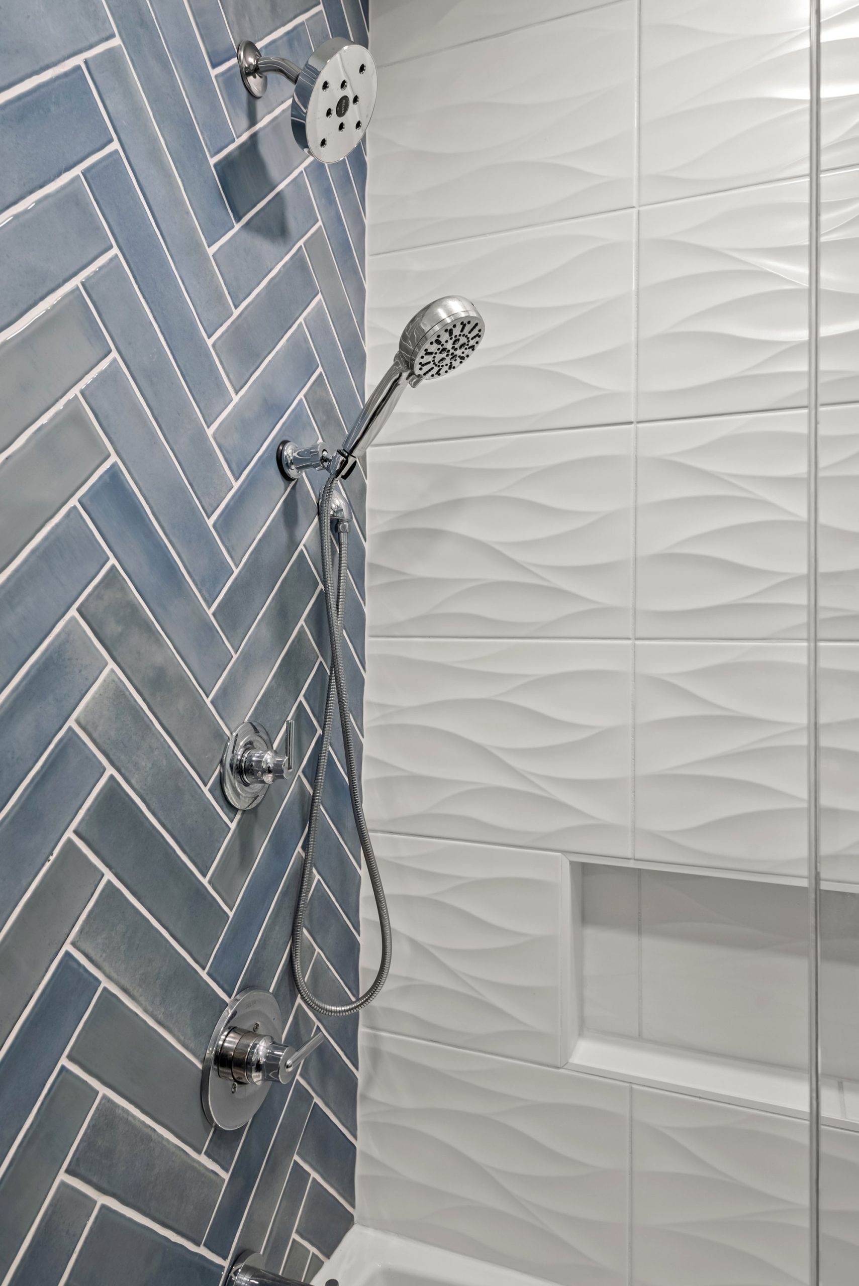 Gulf Way Tampa bath remodel close up of blue herringbone tile