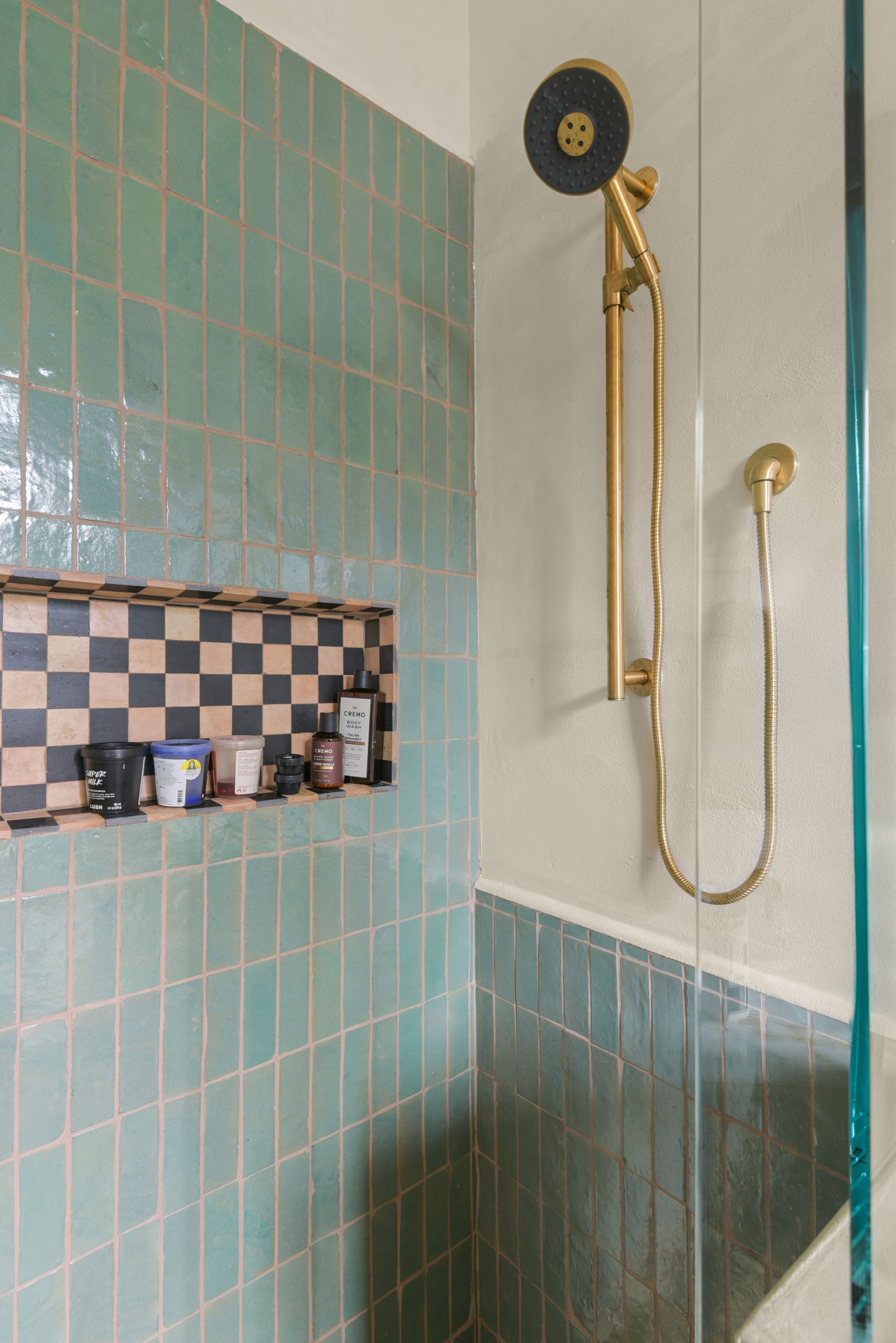 Bathroom remodel project walk-in shower with artisan tile close up