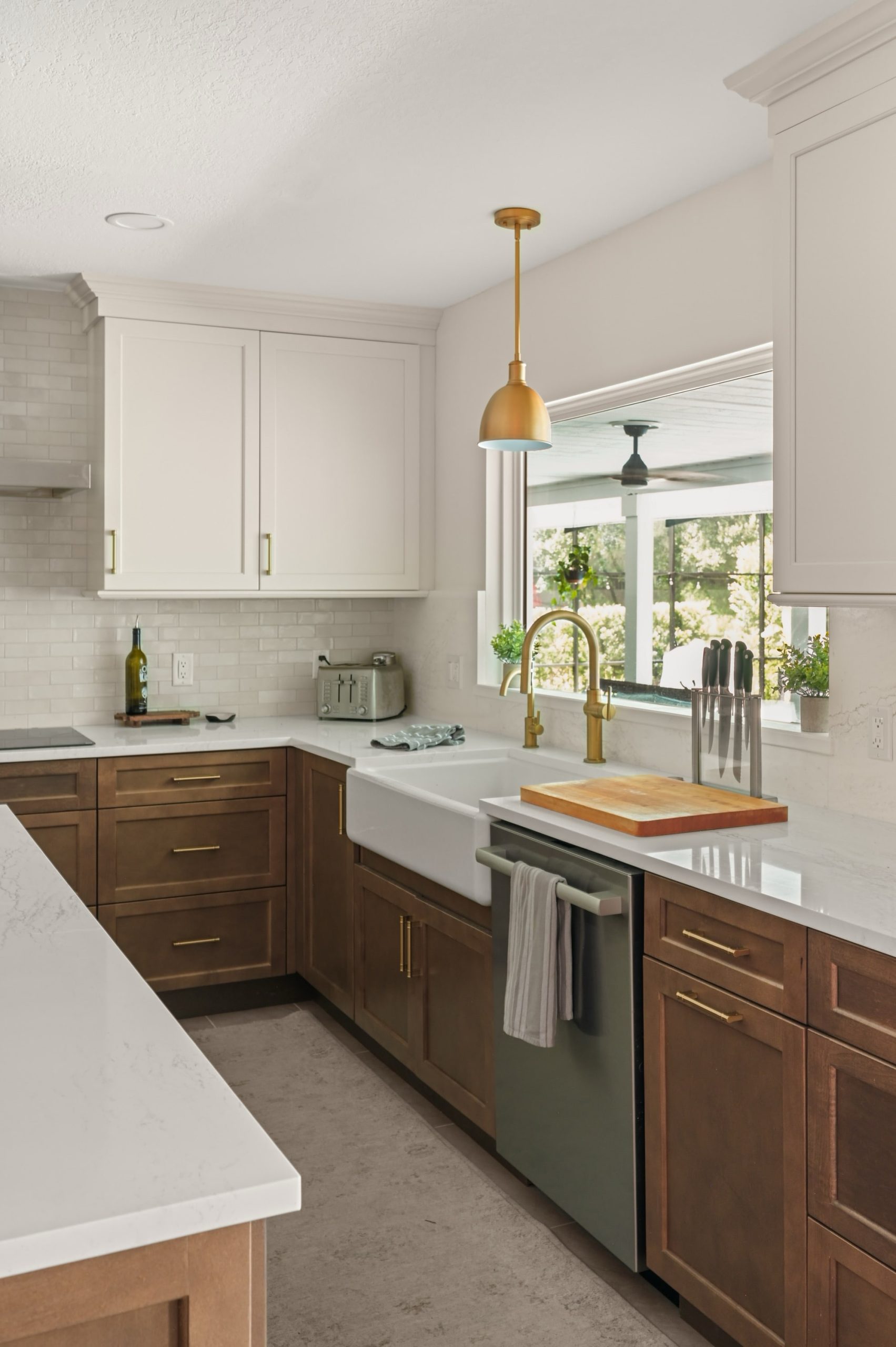 Sweetwater kitchen remodel farmhouse sink with two tone cabinets