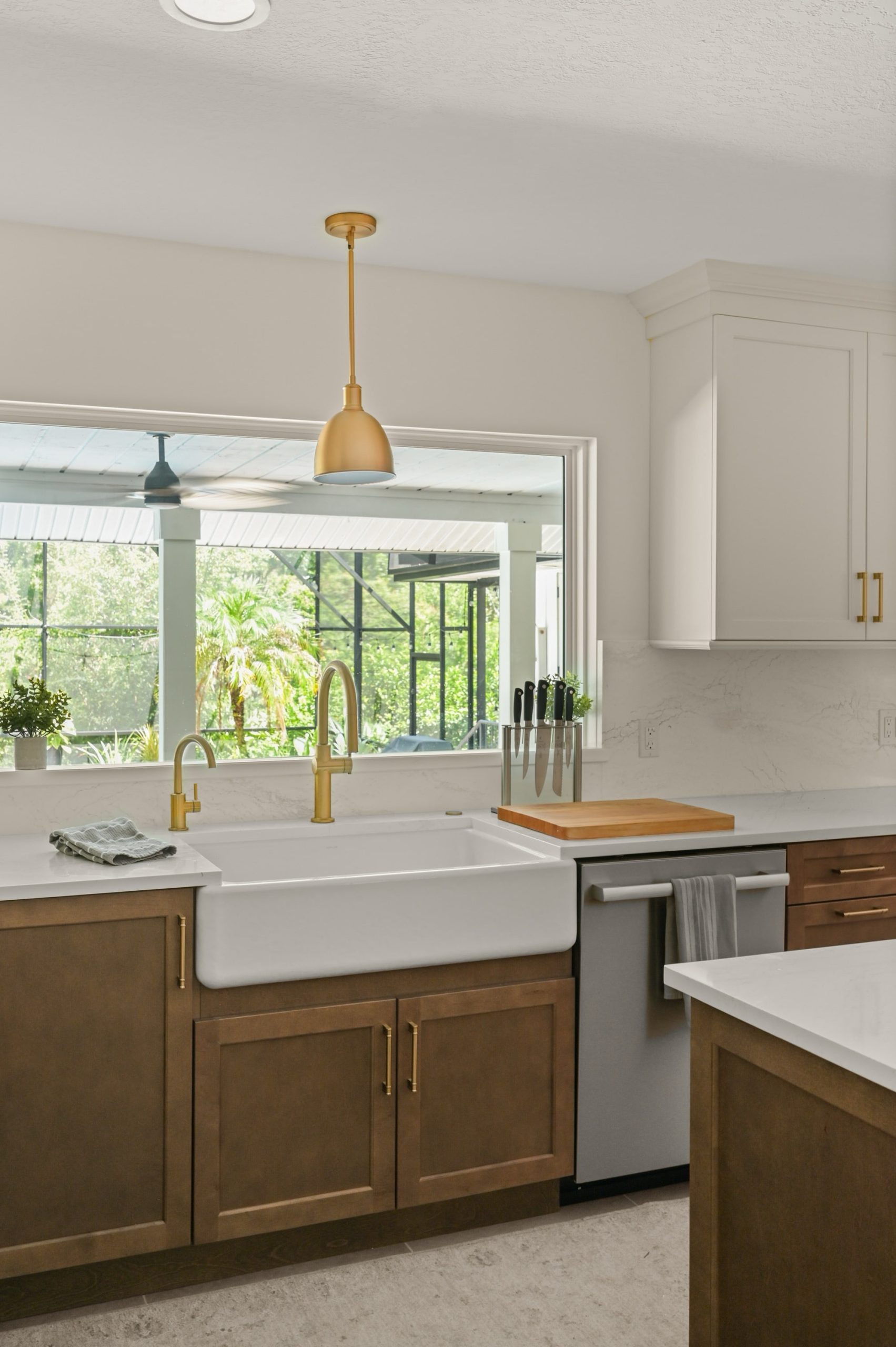 Sweetwater kitchen with close up picture window and farmhouse sink