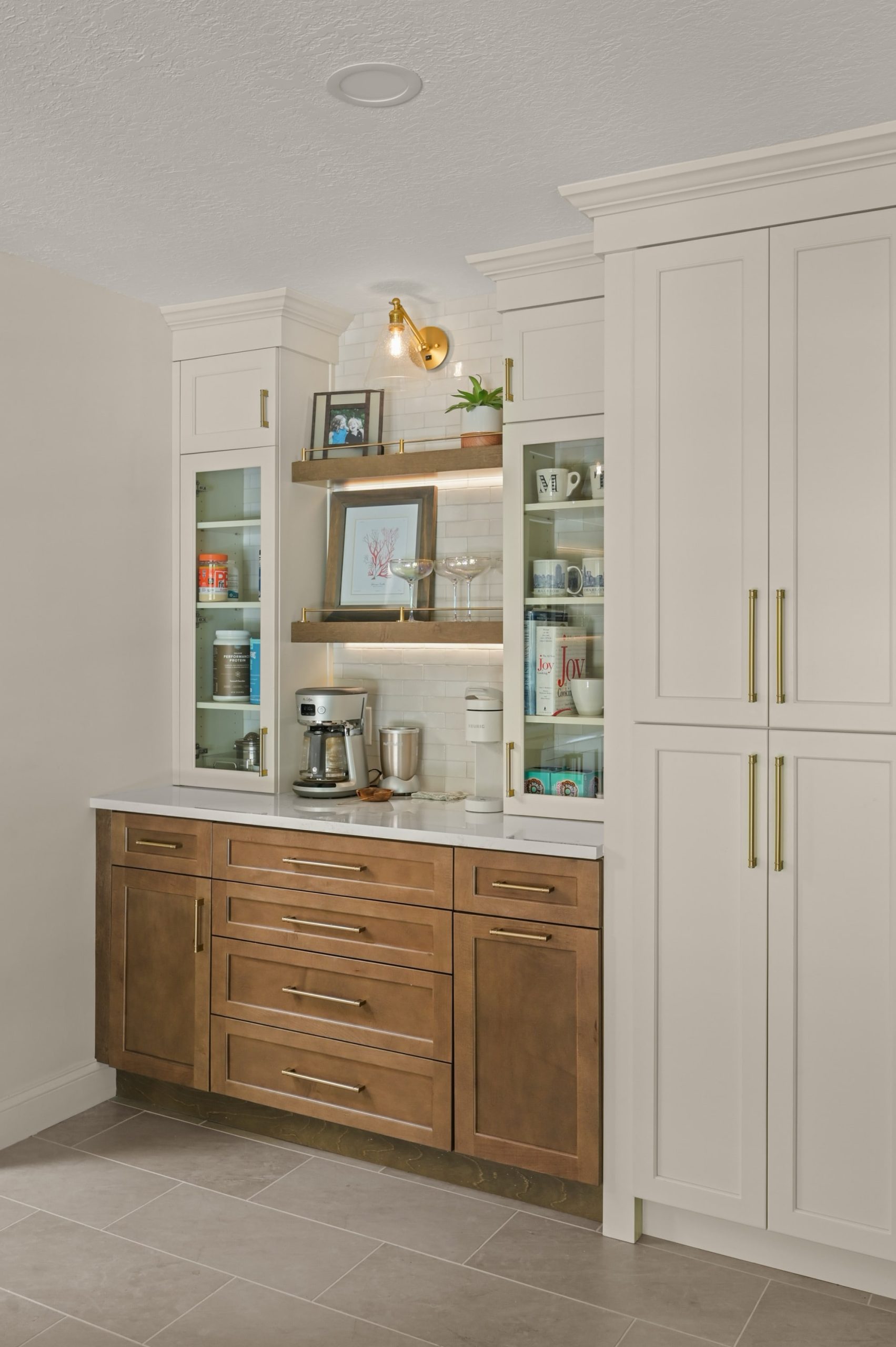 Sweetwater kitchen coffee bar with white pantry cabinets